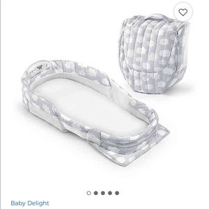 Baby Delight Snuggle Nest portable sleeper